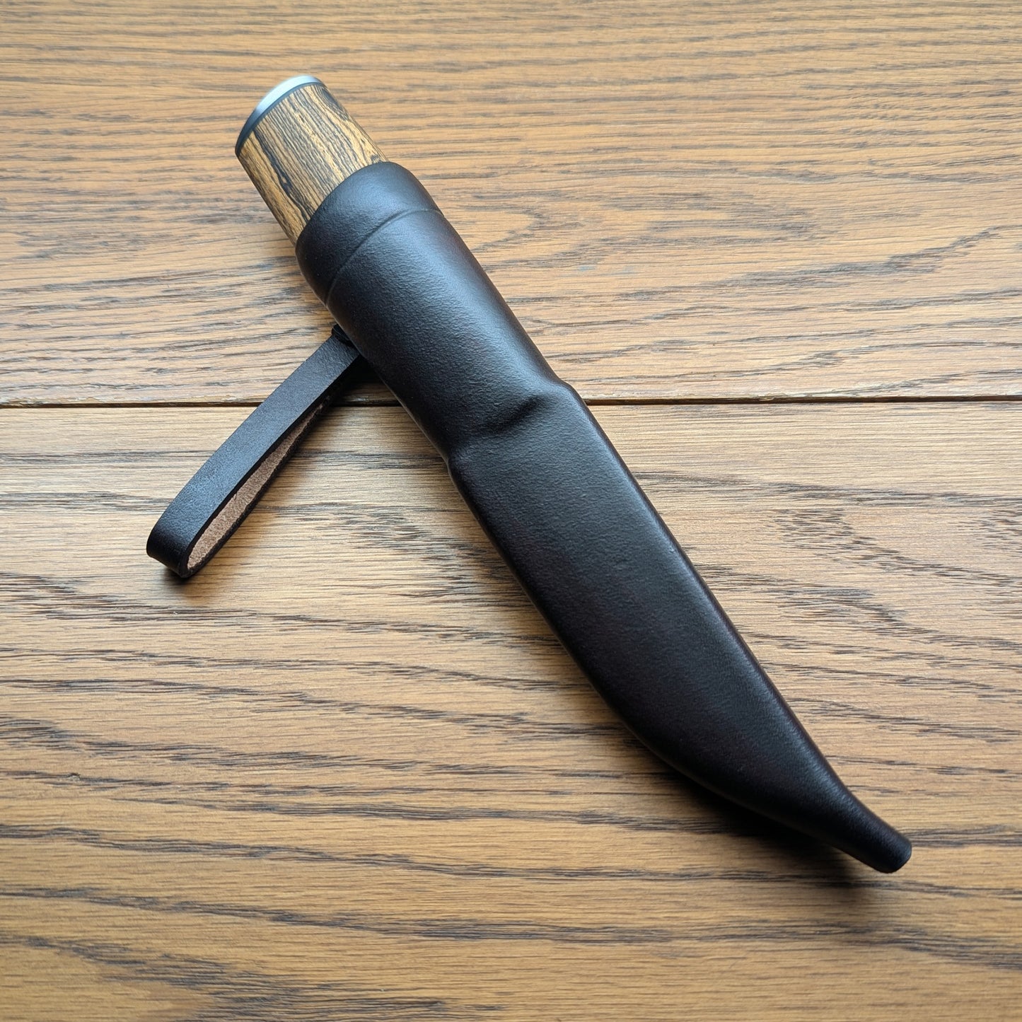 Custom Damascus Puukko knife with Bocote handle and handmade sheath