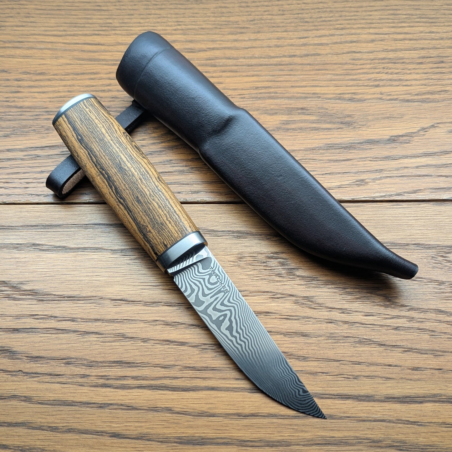 Custom Damascus Puukko knife with Bocote handle and handmade sheath