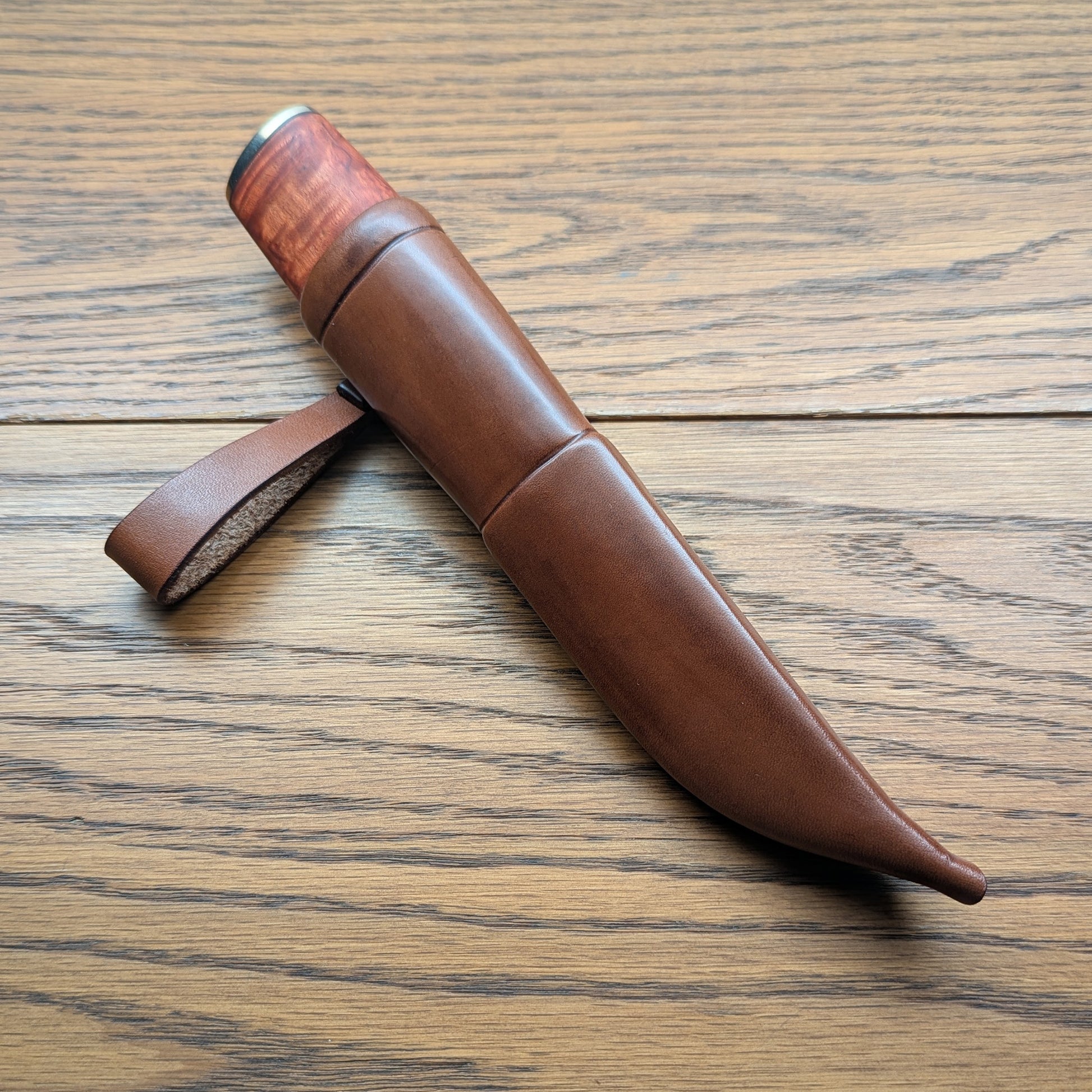 Handmade Puukko knife in custom leather sheath