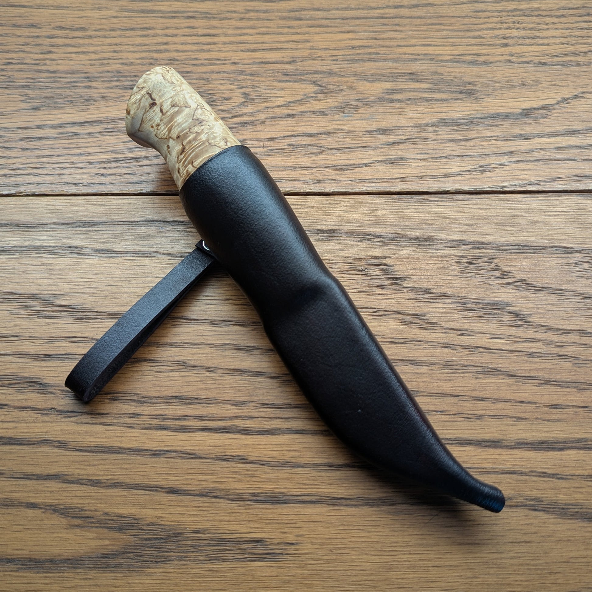 Handmade Puukko knife with Damascus blade in leather sheath